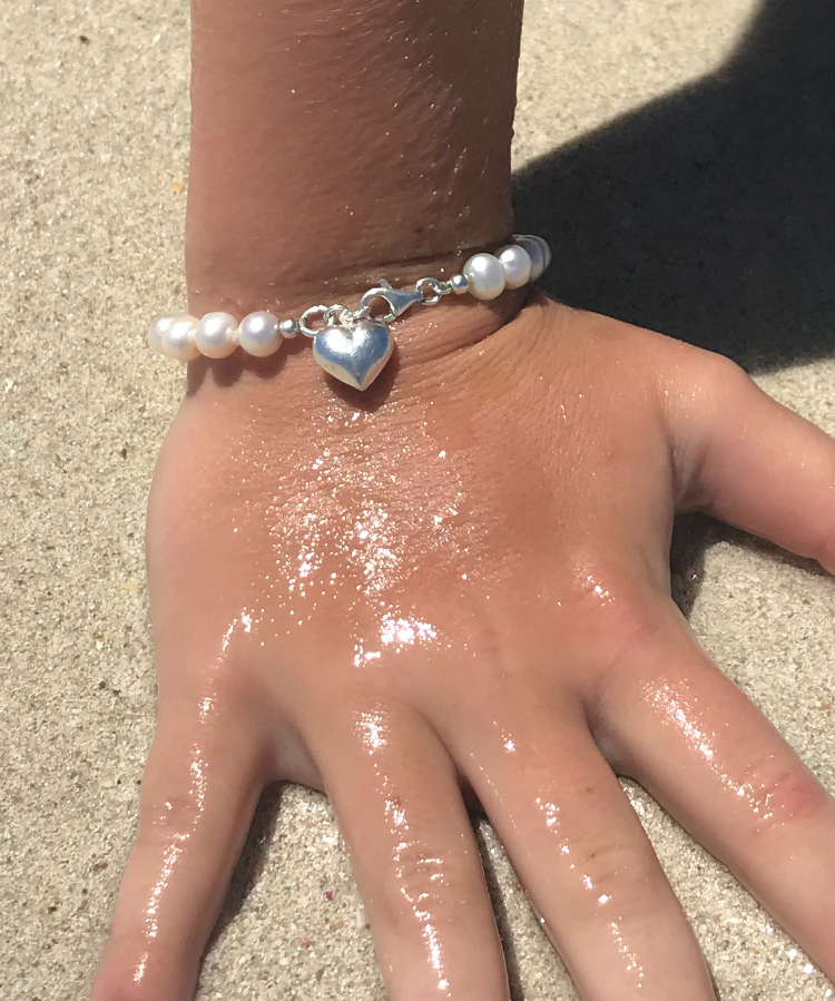 girls pearl bracelet with sterling silver heart charm 