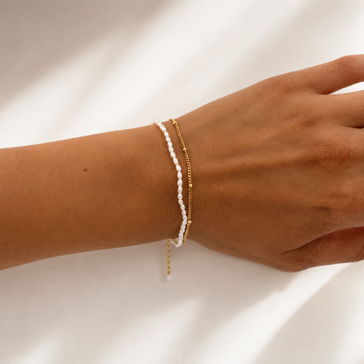 Cascade Pearl Bracelet Gold crafted with genuine freshwater pearls, premium gold vermeil chain, and elegant layered detailing inspired by the Australian coast.