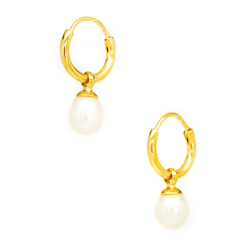 Gold pearl sleeper earrings with 9mm freshwater pearls designed in Broome Western Australia