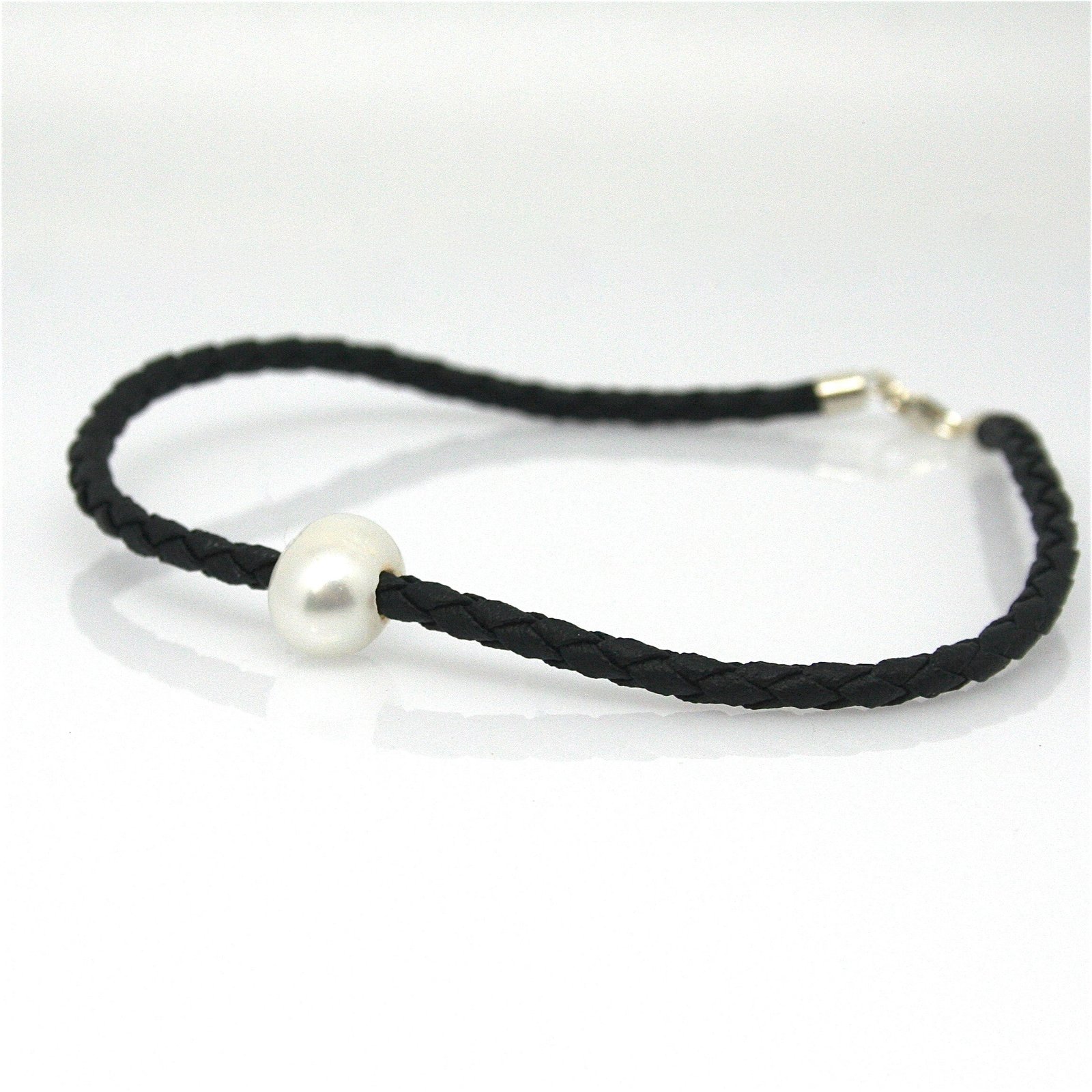 A black braid anklet with a single white pearl and a sterling silver lobster clasp.