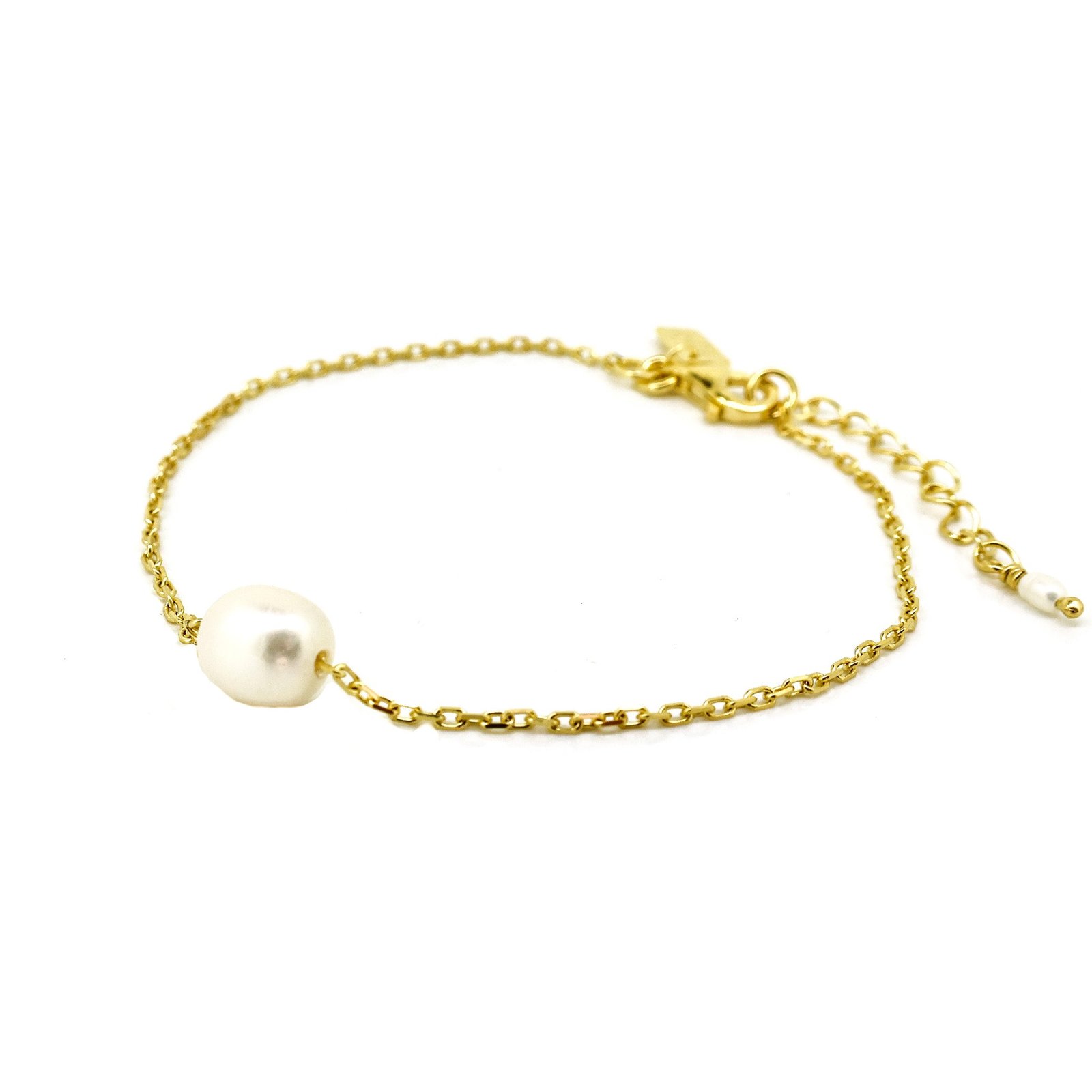 A gold-colored bracelet featuring a single pearl on an adjustable gold vermeil chain, from Lush Designs Jewellery.