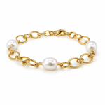 Australian South Sea pearl bracelet featuring three lustrous white pearls and a bold gold vermeil link chain