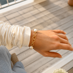 Australian South Sea pearl bracelet featuring three lustrous white pearls and a bold gold vermeil link chain