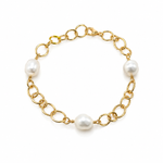 Australian South Sea pearl bracelet featuring three lustrous white pearls and a bold gold vermeil link chain
