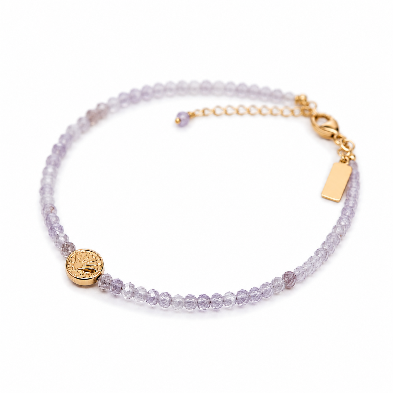 Beach Lavender Love Bracelet crafted with natural faceted kunzite gemstones and gold vermeil shell detail, inspired by the Australian coastline.