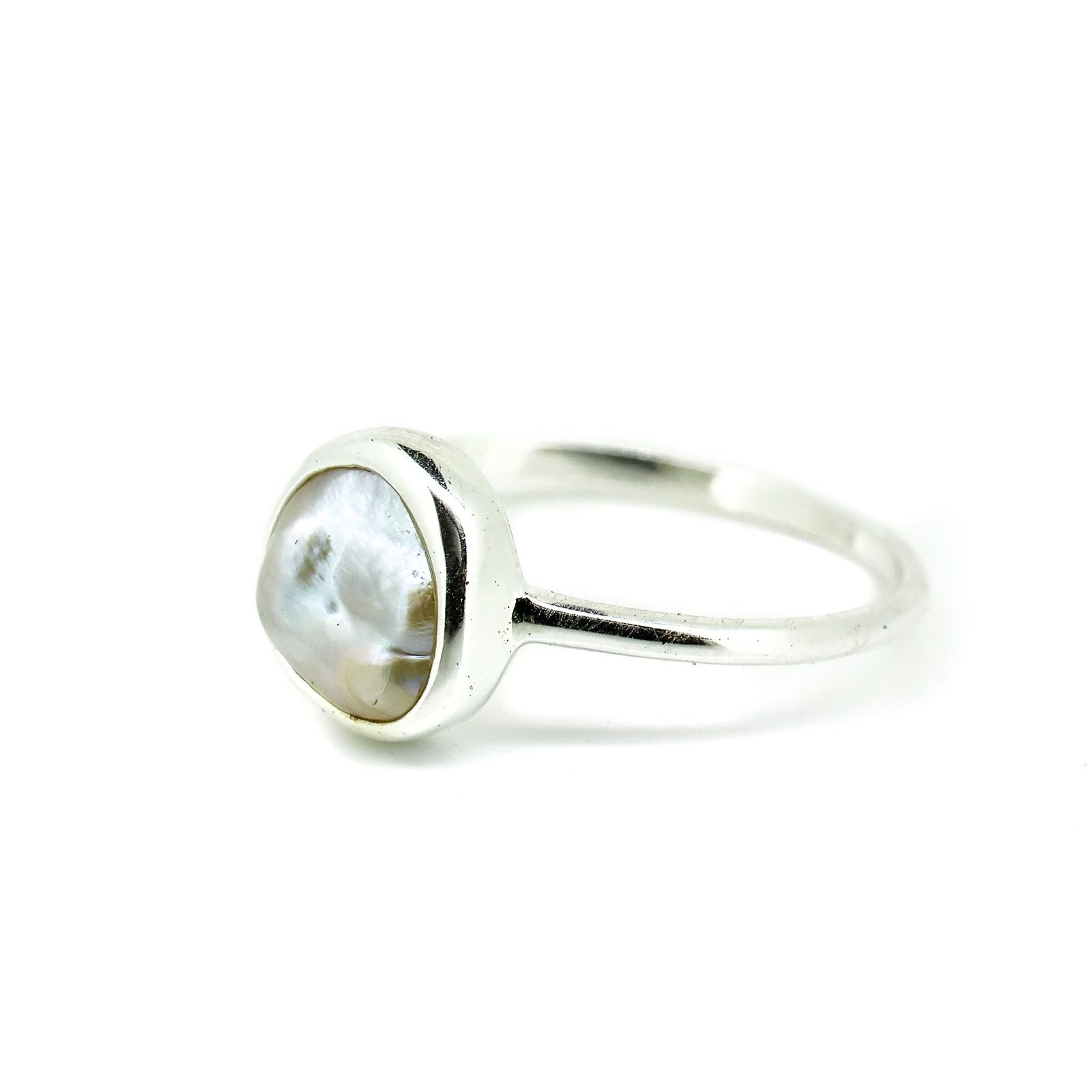 Drift Pearl Ring Silver crafted in premium 925 sterling silver featuring a genuine freshwater pearl in an elegant flowing coastal-inspired design.