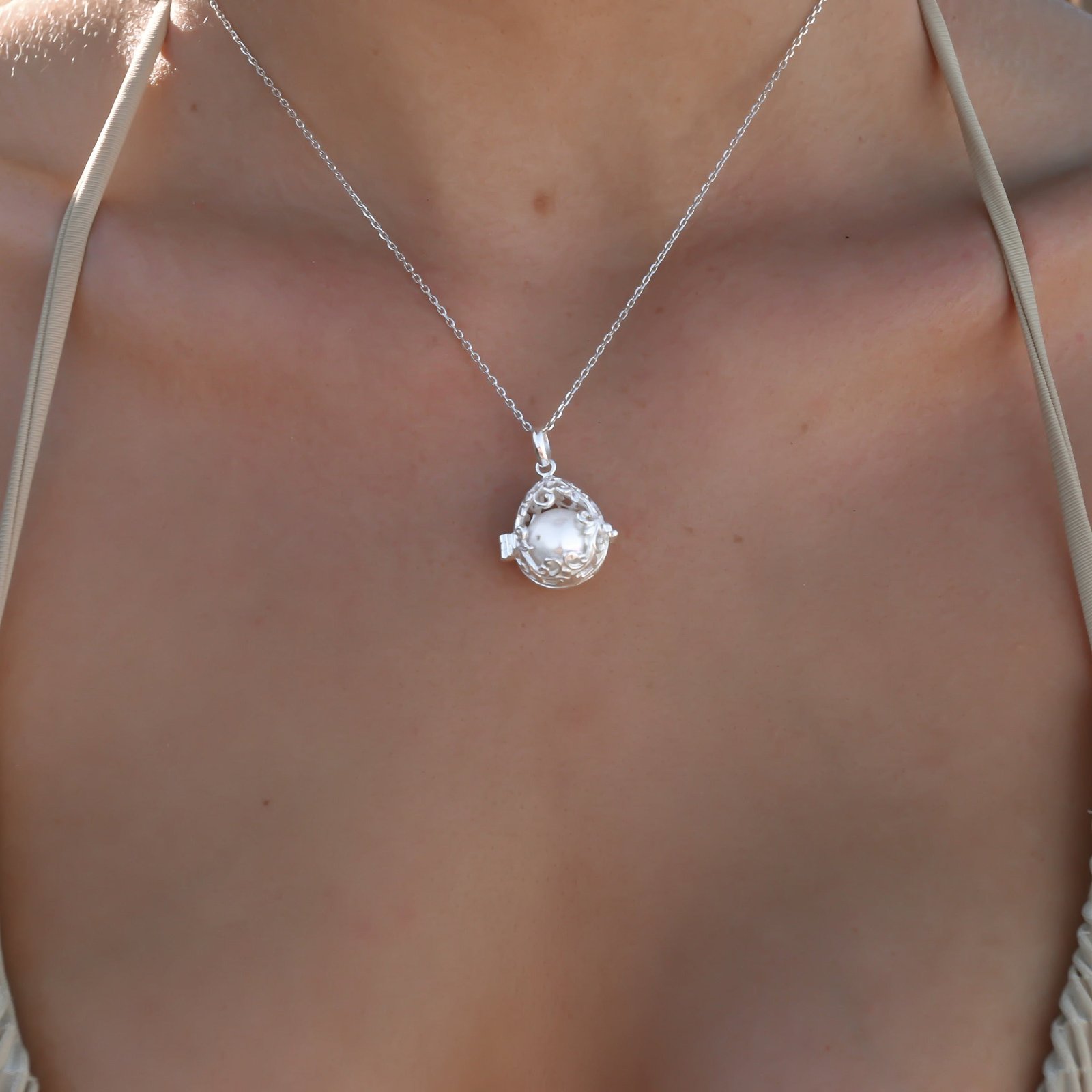 Pearl Locket Silver Pendant crafted in premium 925 sterling silver featuring a genuine freshwater pearl suspended beneath a timeless coastal-inspired silver locket design.
